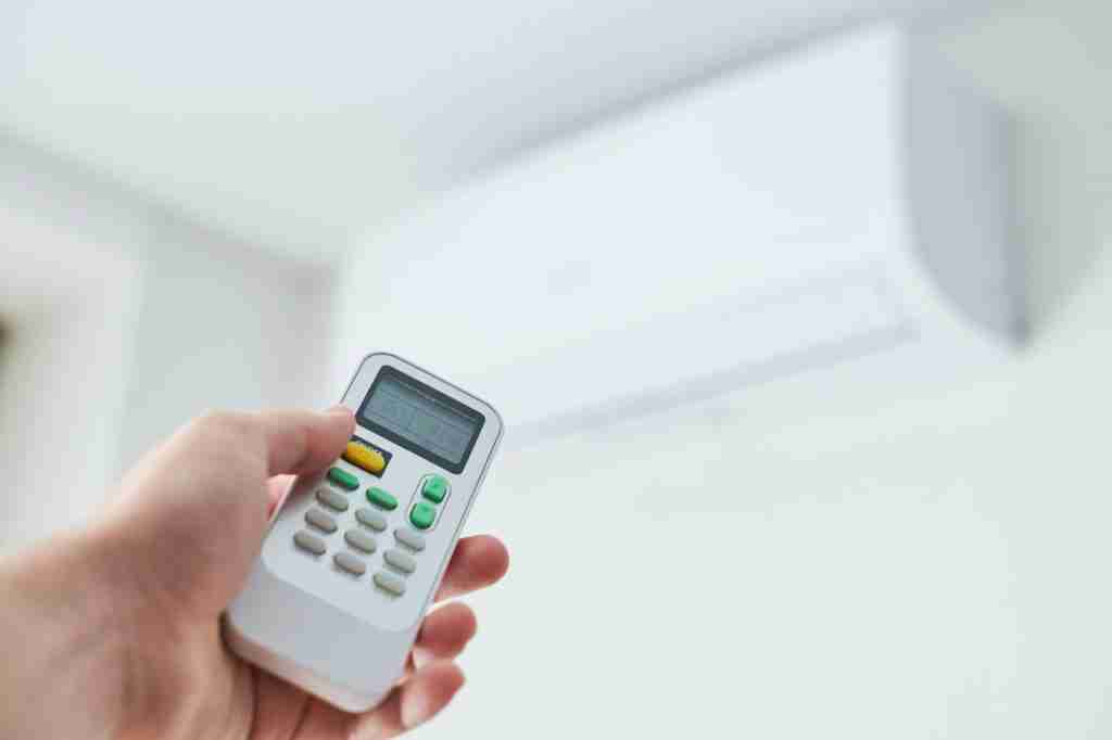 Trusted Amazing Heating and Air, HVAC in Puyllap | Remote control for air conditioner in hand