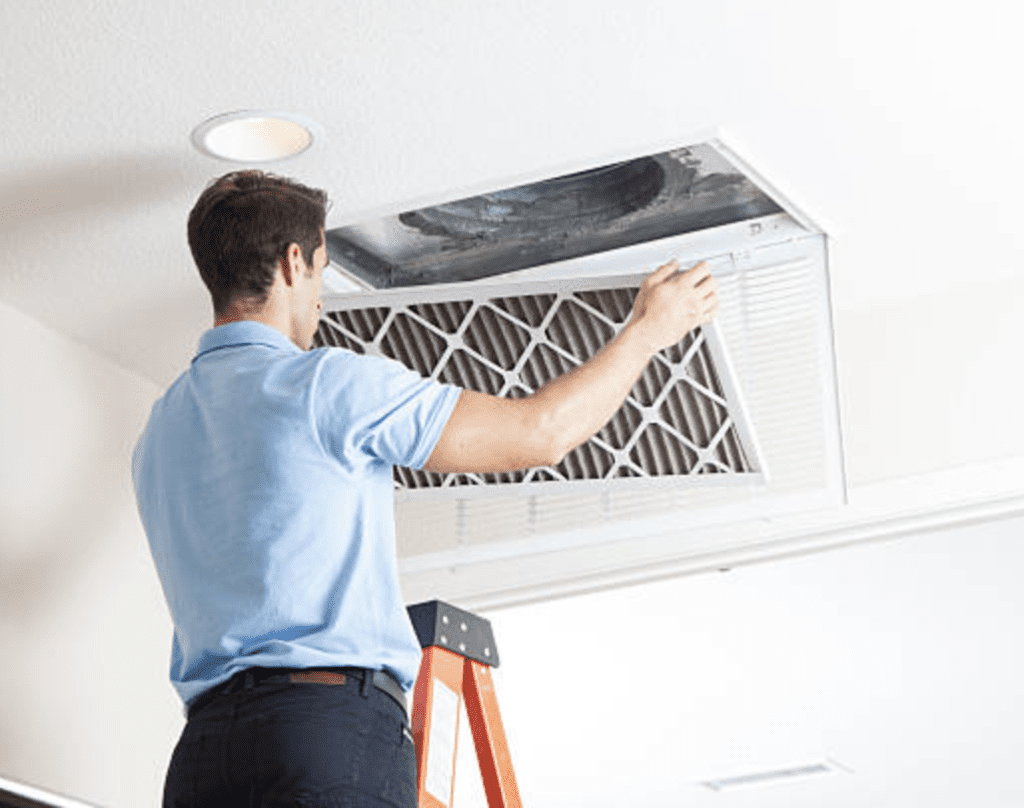 A clean, high-efficiency air filter capturing dust, pet dander, and pollen to illustrate advanced indoor air quality